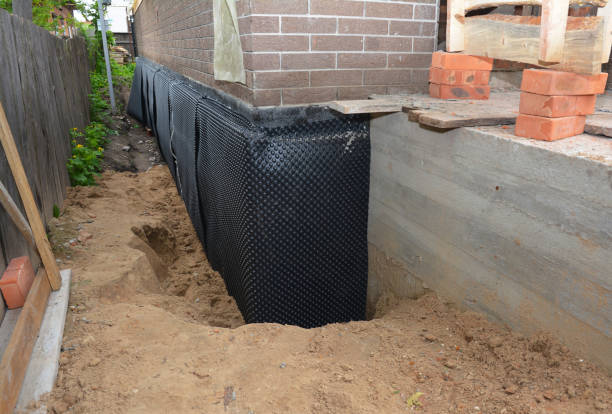 Happy homeowners after waterproofing job in Romeoville
